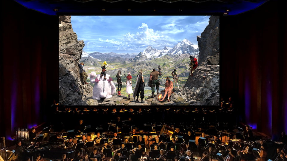 Fort Worth Symphony Orchestra on stage with Final Fantasy game footage projected onto a screen above the musicians