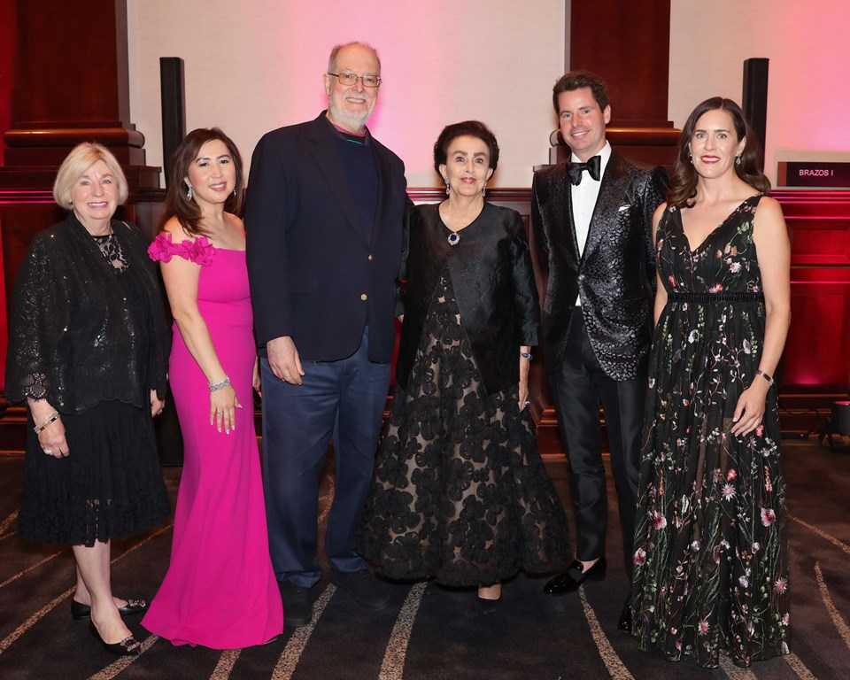 Six people in formal wear at Gala